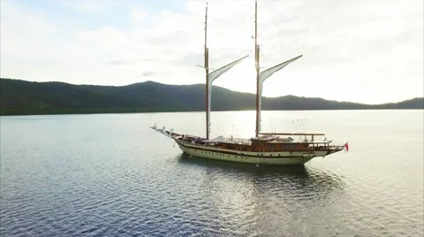 Ship in the sea at sunset Stock Footage 64139052