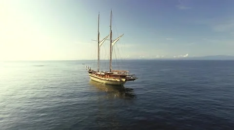 Ship in the sea at sunset Stock Footage 64139150