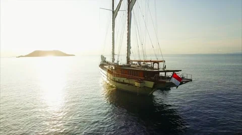 Ship in the sea at sunset Stock Footage 64139169