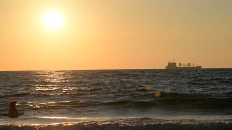 Ship at-sea at sunset a sun Stock Footage 52750187