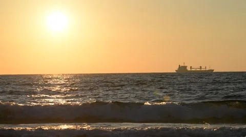 Ship at-sea at sunset a sun Stock Footage 52750916