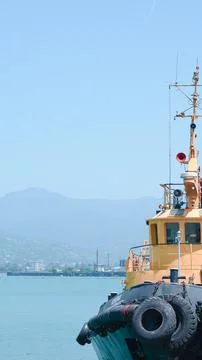 Ship in seaport, deck bathed in summer sunlight, calm and serene... Stock Photos