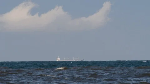 Ship shape cloud and the ship at the sea speeded up motion Stock Footage 93371931