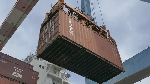 Ship to shore crane container transferred from ship to terminal 4k Stock Footage 108983721