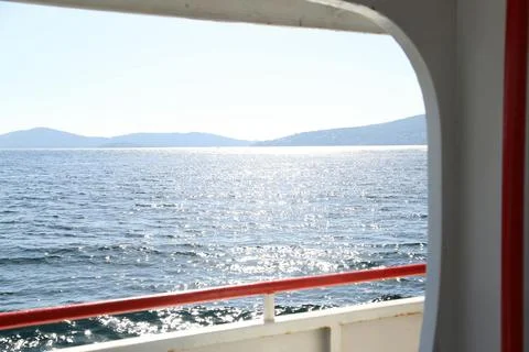 Ship side window under blue sky Stock Photos