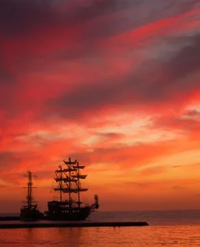 Ship silhouette at sunset Stock Photos