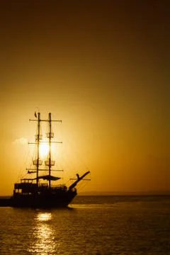 Ship silhouette at sunset Stock Photos