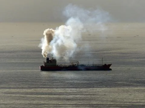 Ship in smoke Stock Photos