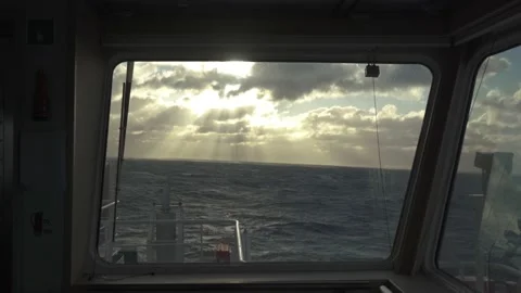 Ship in storm. Back window on bridge. View back to sea and sunset. Strong Stock Footage 204153782