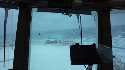 Ship in storm. Bridge inside. View back to stern. Strong pitching. High waves Stock Footage 180200301