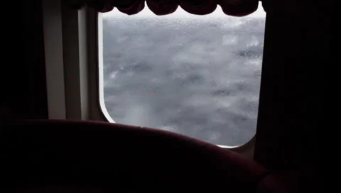 A ship in a storm at sea, high waves shake the ship, a view from the window Stock Footage 147934496