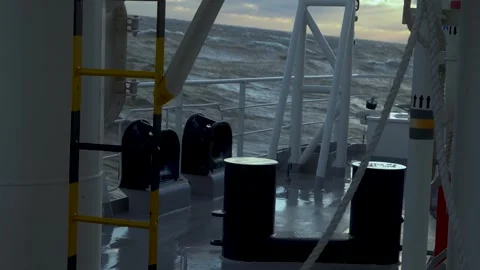 Ship in storm. Strong pitching at stern of vessel. High waves outside. Stock Footage 270781546