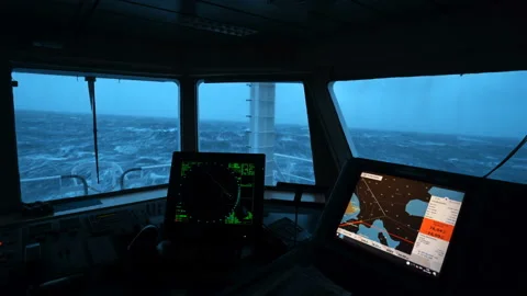 Ship in storm. Vessel bridge inside. Radar and map. Strong pitching. White foam Stock Footage 178974220