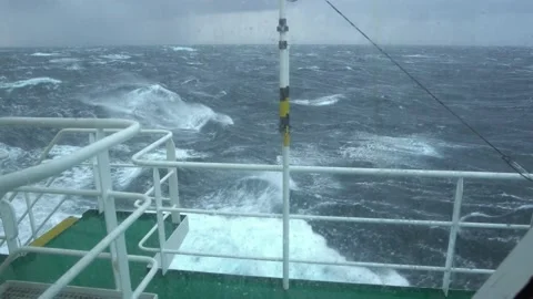 Ship in storm. View from bridge. Ship climb up wave. Splashes. Salt water on Stock Footage 163053482