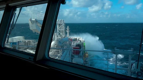 Ship in storm. View from bridge. Splashes from waves at bow of tanker. Strong Stock Footage 245391518