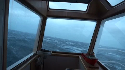 Ship in storm. View from bridge wing. Strong pitching. High waves hit vessel Stock Footage 178653621
