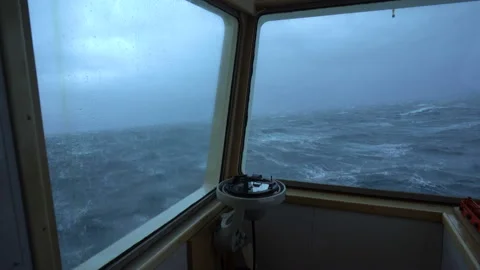 Ship in storm. View from bridge wing. Strong pitching. High waves hit vessel Stock Footage 180668006
