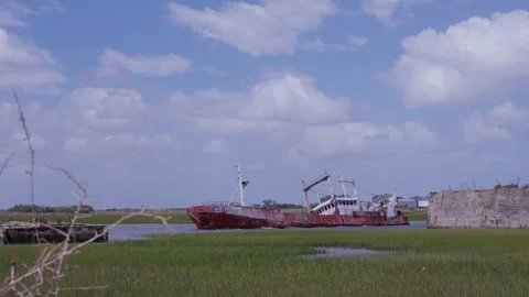 Ship Stranded on the Shore 01 Video stock 303251270