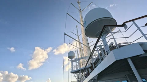 Ship structure with masts and sails unfurled as clouds pass slowly Stock Footage 232950787