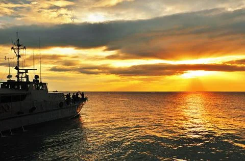 Ship in the sunrise Stock Photos
