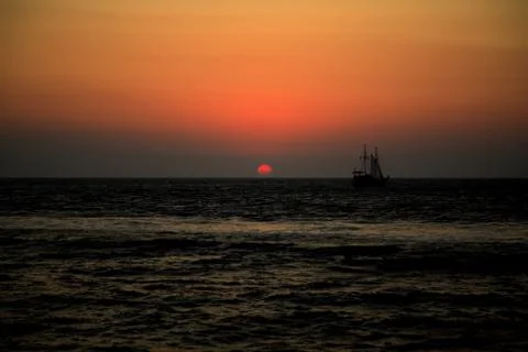 Ship in the sunset Stock Photos