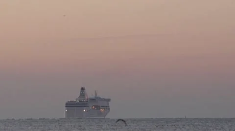 Ship at sunset in raid Stock Footage 20530343
