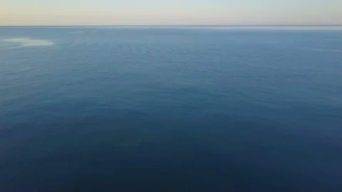The ship swims forward, the drone flies back. In the background there is a Stock-Footage 93299671