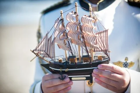Ship toy in the hand Stock Photos