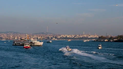 Ship traffic on the Bosphorus during sunset in slow motion. Stock Footage 260832330