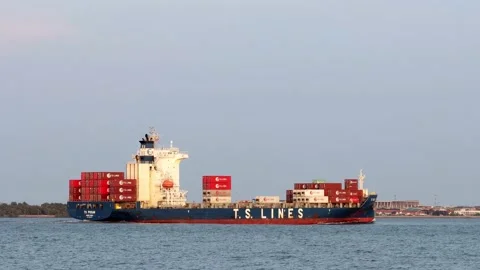 The Ship TS PUSAN loaded of containers sails from the Chao Phraya River Stock Footage 235424835