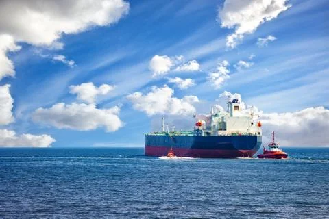 Ship with tugs Stock Photos