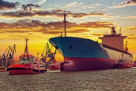 Ship with tugs Stock Photos