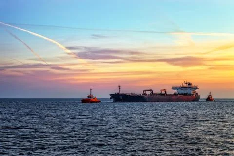 Ship with tugs Stock Photos