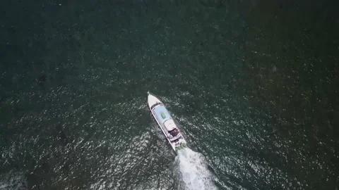 Ship turning in shallow waters off beach Video stock 155462608