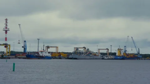 The ship unloads cargo in the port Stock Footage 65349638