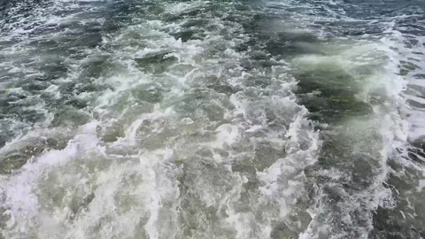 Ship wake waves behind a moving boat, foamy water trail and engine turbulen.. Stock Footage 335401627