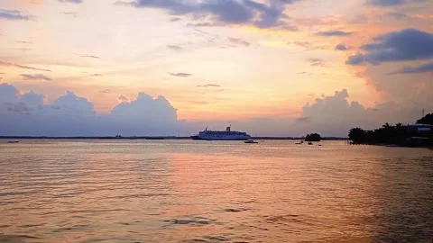 A ship was seen in the distance sailing in the afternoon before sunset. the.. Stock Footage 273962865
