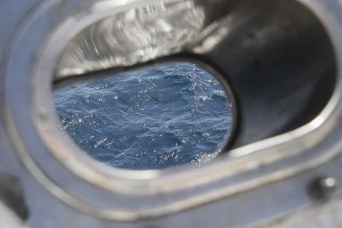 Ship window with the sea Stock Photos