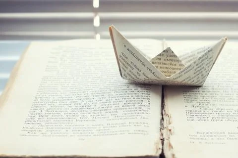 Ship of words in the book Stock Photos