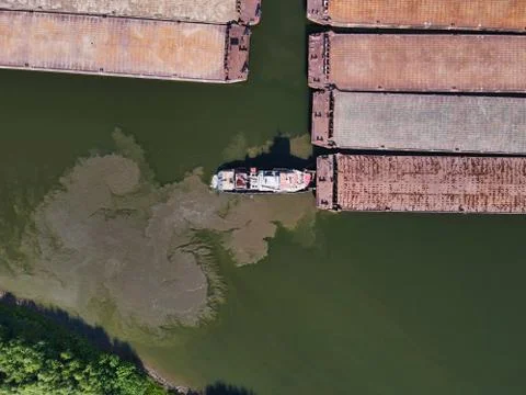 Ship work with barges on the river Stock Photos