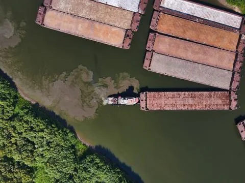 Ship work with barges on the river Stock Photos