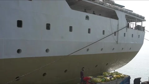 Ship worker throw a plastic garbage Video stock 200130747