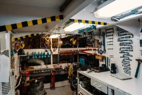 Ship workshop or instrument store. Many different tools Stock Photos
