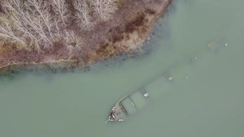 Ship Wreck of the Second World War in the Po river in winter drone view, Emilia Video stock 226019893