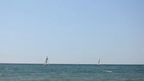 Ship yachts with white sails in the open sea. Stock Footage 117482554