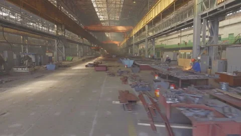 Shipbuilding plant, Internal welding workshop m erection of metal structures.  Stock Footage 104184857