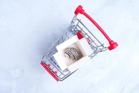 Shipping box with human brain in a push cart Stock Photos