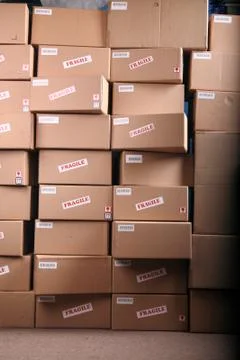 Shipping boxes in warehouse Stock Photos