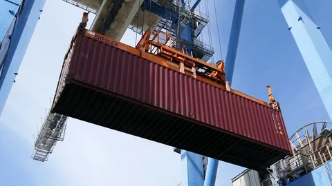 Shipping container above ship 4k intro video for business Stock Footage 104505138