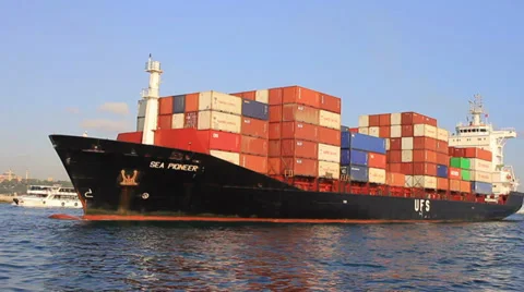 Shipping container delivery. Cargo ship arriving in port Stock Footage 37495330